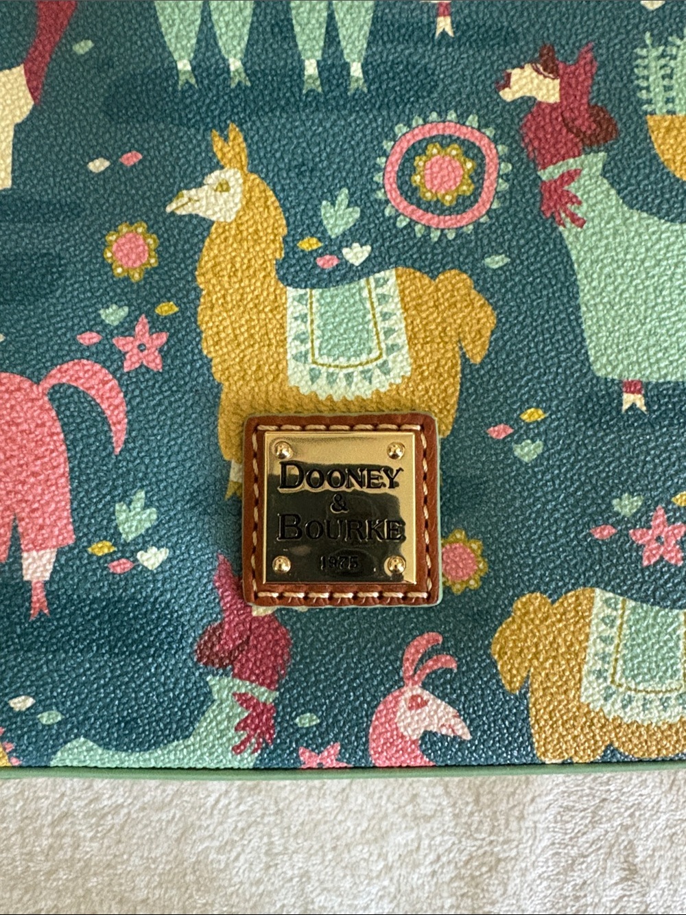 Dooney & Bourke Emperor’s New Groove Crossbody Bag - Picture 2 of 10